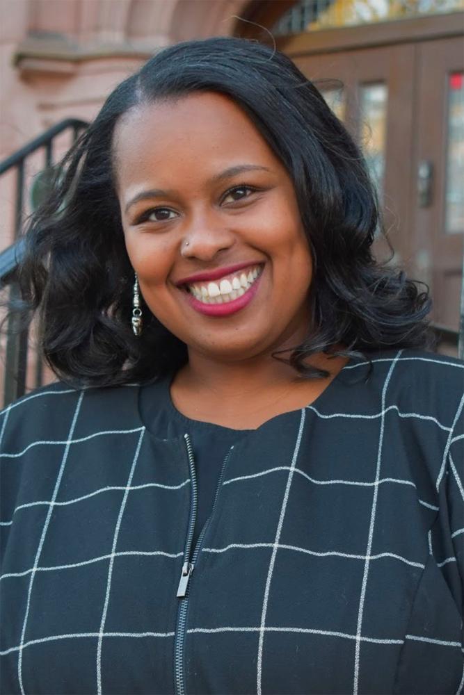Dr. Taneisha Means