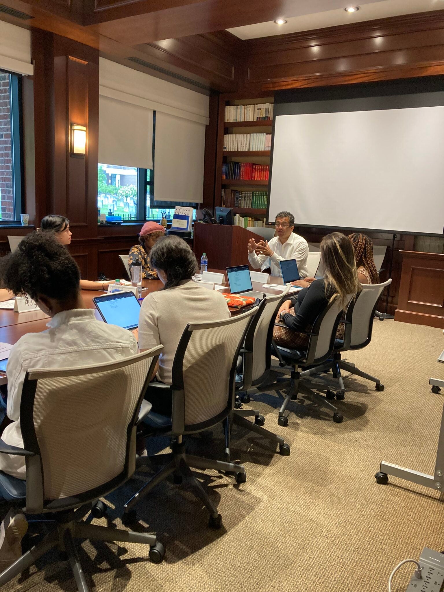 A faculty member leads a session on why research methods matter